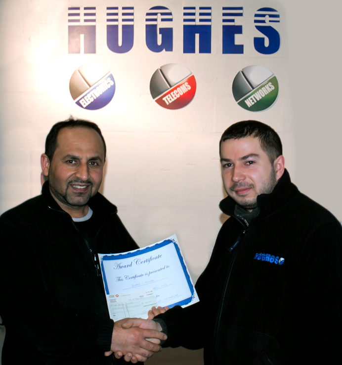 Receiving-prize-for-Hughes-Electronics-innovation Receiving-prize-for-Hughes-Electronics-innovation